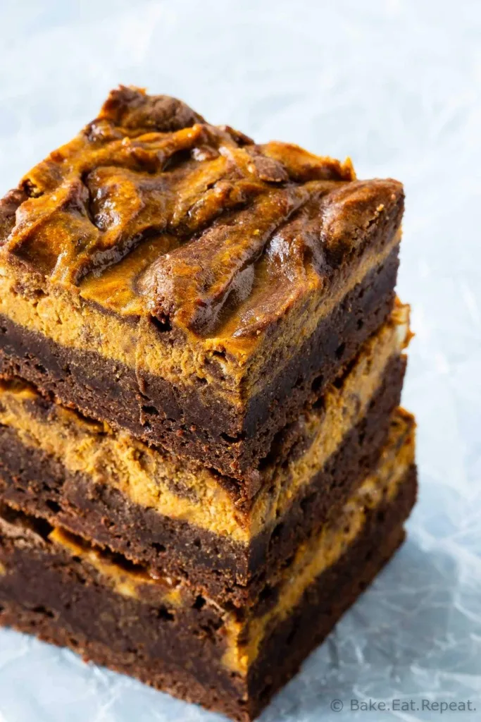 Easy chewy brownies swirled with creamy pumpkin cheesecake