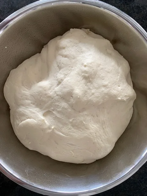 Bread dough after rising until doubled.