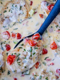 skillet chicken in a garlic cream sauce with tomatoes, basil and zucchini