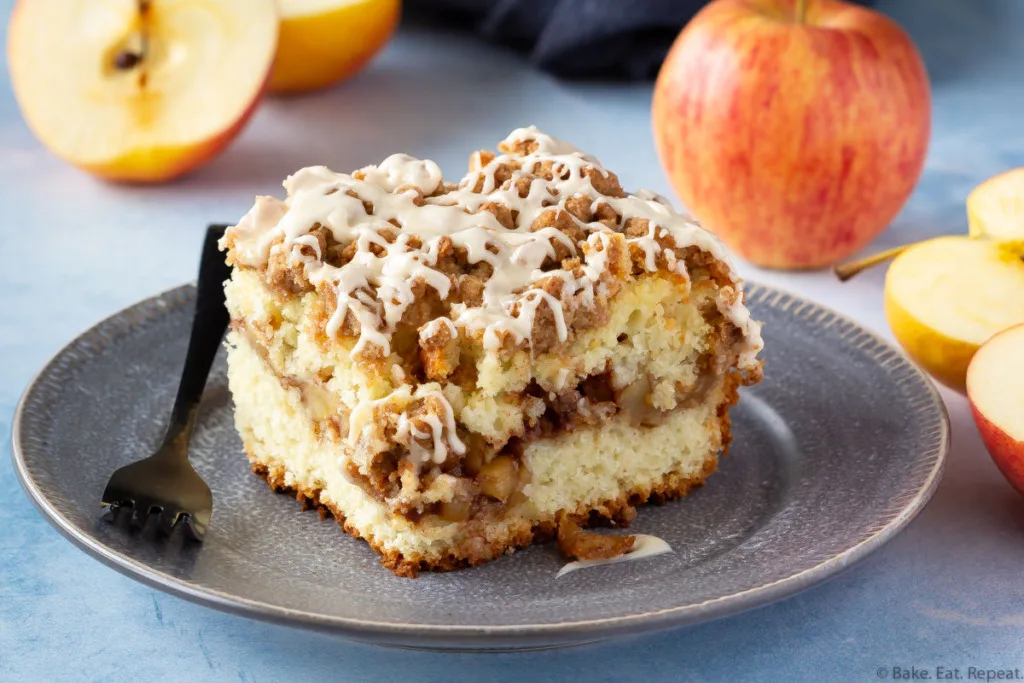 A piece of apple cinnamon coffee cake on a plate