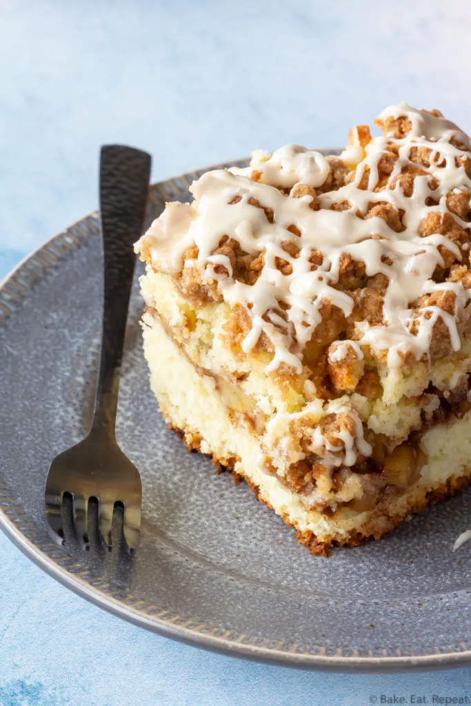 Piece of apple cinnamon coffee cake on a plate