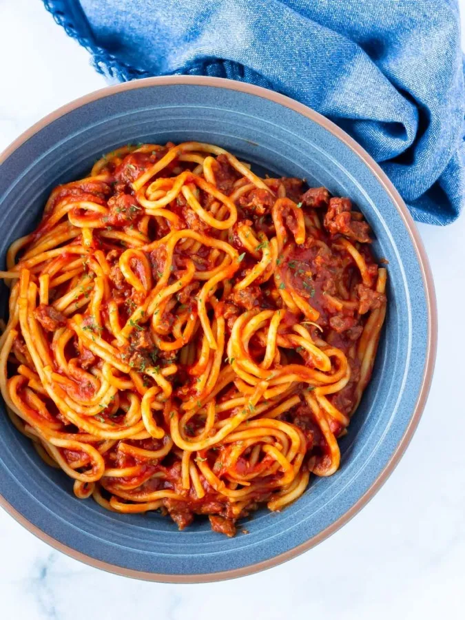 A bowl of spaghetti and meat sauce cooked in the pressure cooker.