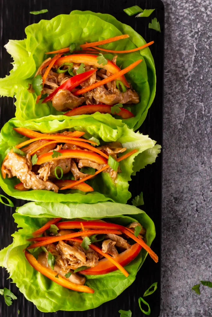 Hoisin chicken lettuce wraps on a platter.