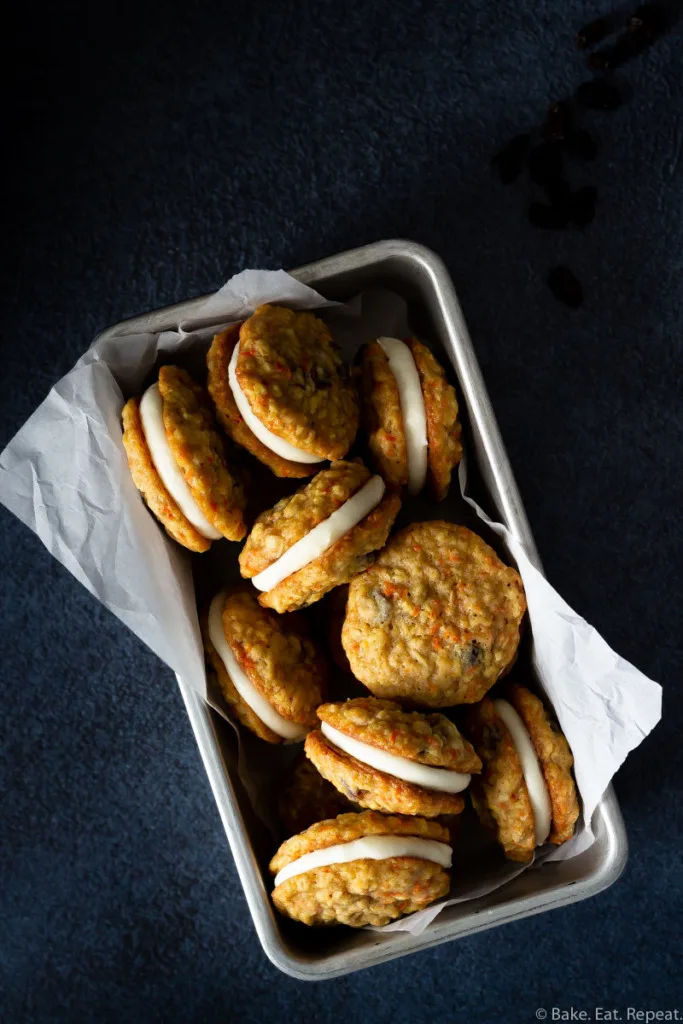 chewy carrot oatmeal raisin sandwich cookies with cream cheese frosting