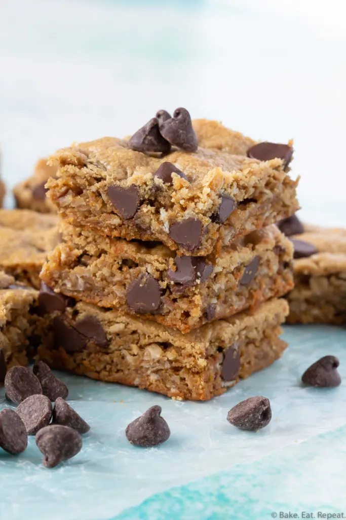 A stack of 3 oatmeal peanut butter bars with chocolate chips.