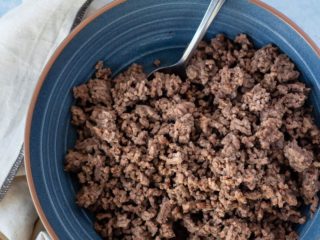 Cooked ground beef in a bowl after cooking from frozen in the Instant Pot.