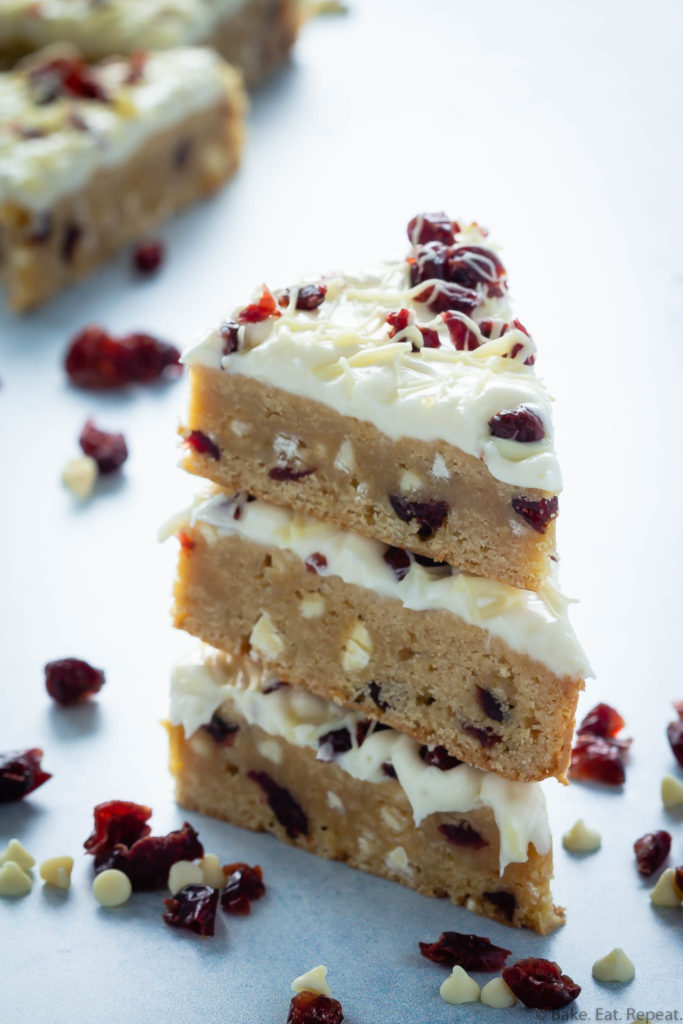 cranberry and white chocolate studded blondies with cream cheese frosting