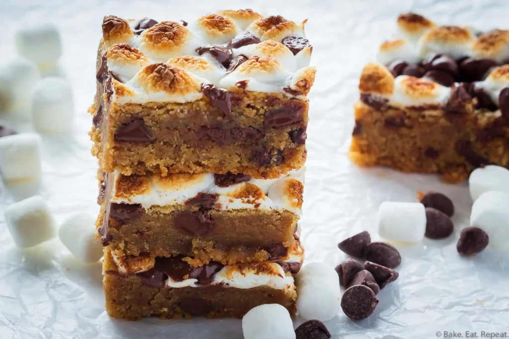 easy peanut butter cookie bars with toasted marshmallows and chocolate chips