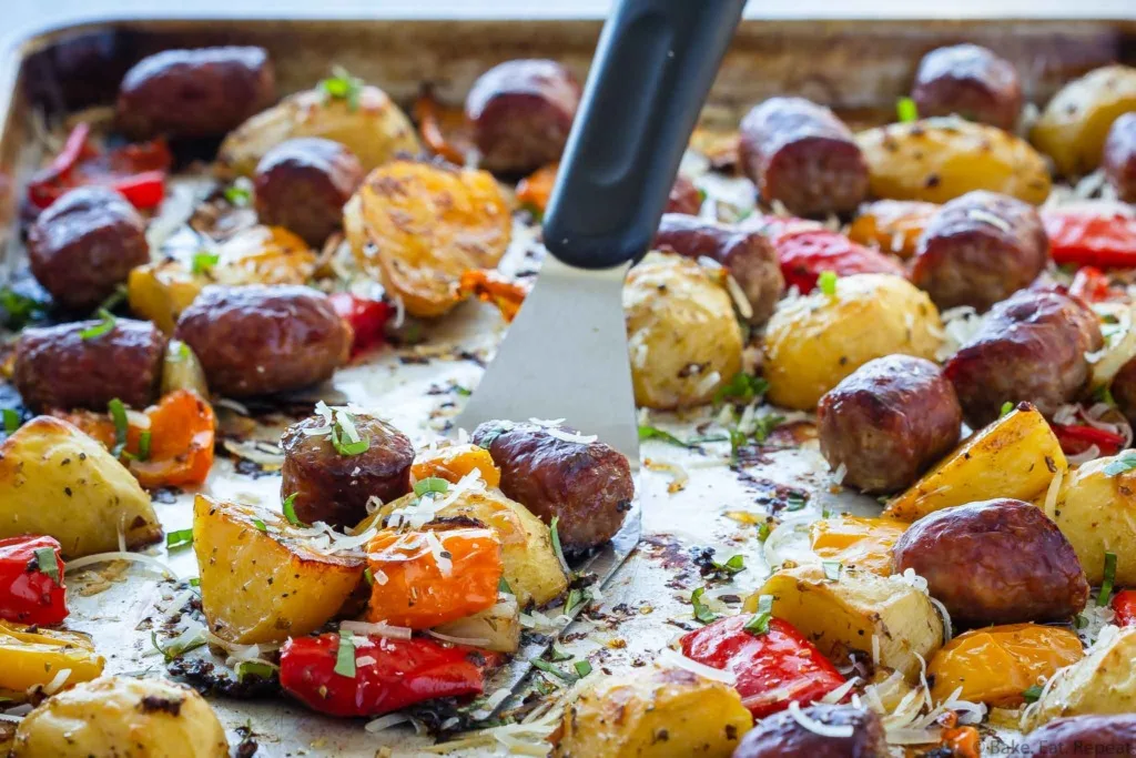 Baked Italian sausage, peppers, potatoes, and onions