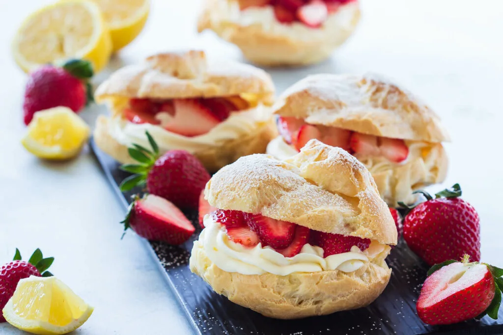 easy cream puffs filled with lemon curd, lemon cream, and fresh strawberries